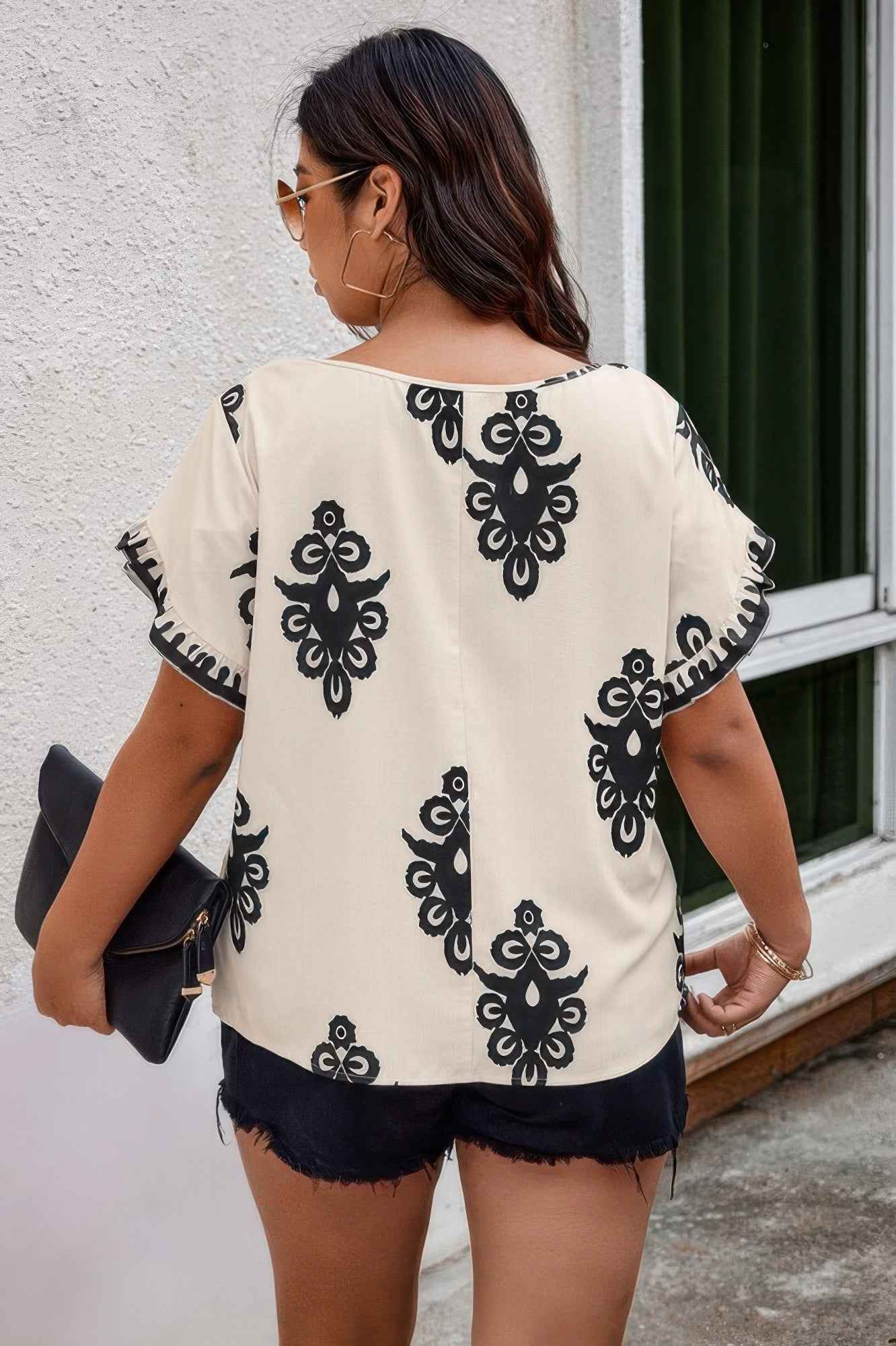 Plus Printed Ruffle Hem Wide Round Neck Blouse